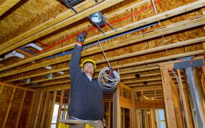 Working process on of electrical wires in installing electrical cable wire in new house construction site